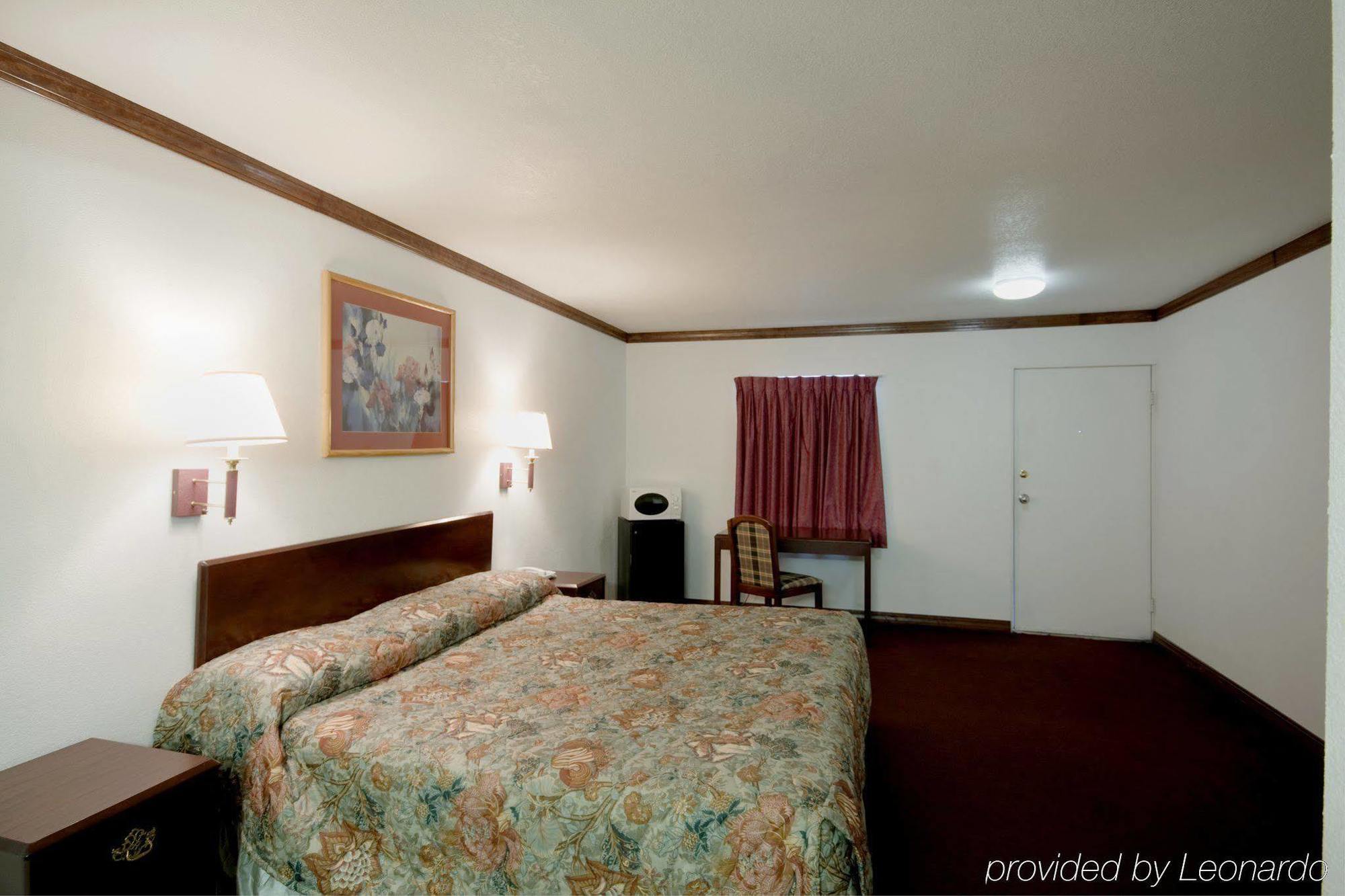 Executive Inn Muldrow Habitación foto