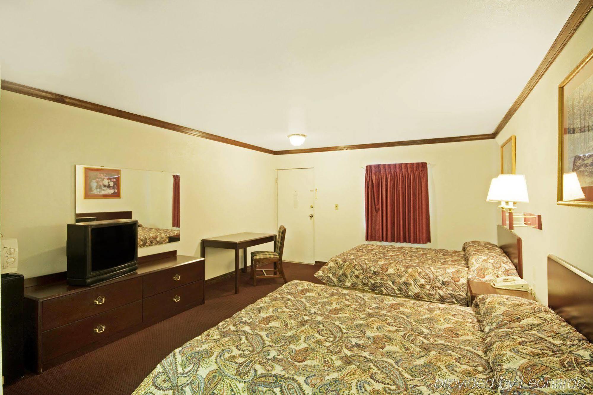 Executive Inn Muldrow Habitación foto